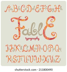 Decorative handwritten font with accented big letters