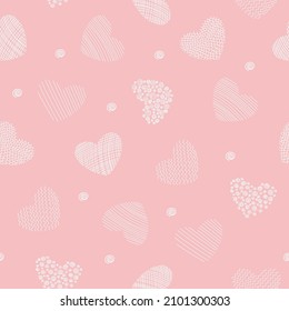 Decorative hearts pattern. White hearts on a pink background seamless pattern. Hand drawn gift packaging, wrapping paper for Valentine’s day celebration.