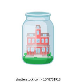 Decorative house in jar on white background.