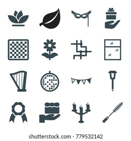 Decorative icons. set of 16 editable filled decorative icons such as gift, chess board, flower, street lamp, harp, spu, party flag, ribbon, mask, disco ball, candlestick