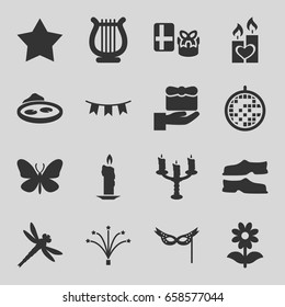 Decorative icons set. set of 16 decorative filled icons such as butterfly, star, slippers, flower, pond, candle heart, harp, party flag, fireworks, mask, disco ball
