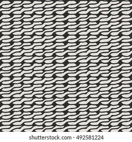 Decorative knit seamless pattern. Hand drawn endless black and white knitting ornament. Trendy messy knitwork texture. Vector design for cloth, backdrops, apparel, wrapping, wallpaper