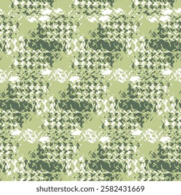 Decorative knitted camouflage, fabric texture. Fashionable camouflage Green theme textured pattern background