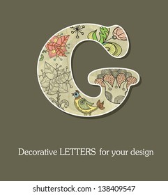 Decorative letter, font with flowers and birds