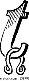 A decorative letter T with horseshoe, vintage line drawing or engraving illustration