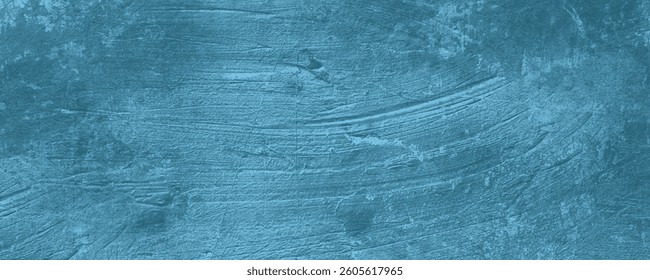 A Decorative and Modern Blue Painted Wall with Visible Streaks and Smooth Color Transitions

