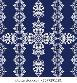 A decorative navy blue pattern featuring intricate white floral and ornamental designs arranged symmetrically.