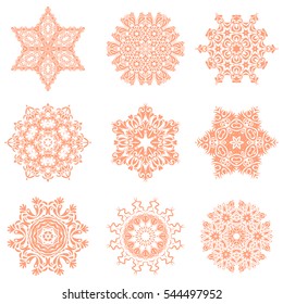 Decorative orange snowflakes set. Vector illustration. Vector sketch on white background for Christmas.