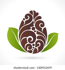 Decorative ornamental cocoa bean with leaves isolated on white. Vector abstract logo design element for packaging design, banner, poster, business sign, identity, branding