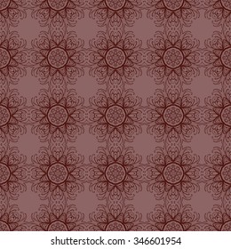 Decorative ornamental seamless pattern. In brown colors.