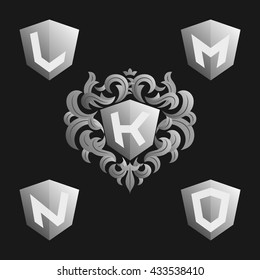 Decorative Ornate emblem template. Stylish set of vector monograms. Silver shield with crown and letters from K to O.