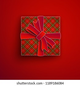 Decorative paper cut gift box isolated on red background. Red bow, ribbon festive element for holiday design, christmas greeting card decoration. Top view, 3d paper cut out style, vector illustration