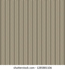 Decorative pattern with herringbone strips. Textile print in brown and beige shades. Wallpaper texture. Vector illustration.