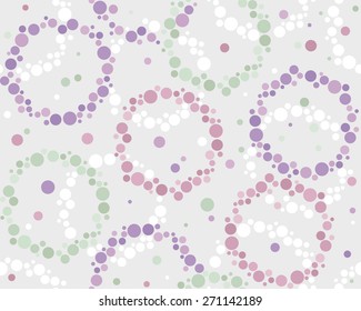 Decorative pattern of multicolored rings and dots in soft colors