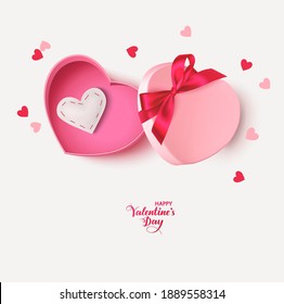 Decorative pink gift box with red bow, white felt heart and heart confetti isolated on white background. Valentines day design template. Vector stock illustration.