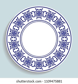 Decorative plate with a circular blue pattern. Blue background. Vector illustration.