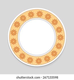 Decorative plate on gray background, top view