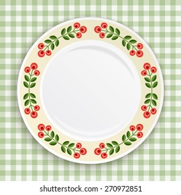 Decorative plate with patterned floral border, on gingham  tablecloth. Blank plate, top view. Vector illustration.