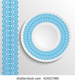  Decorative plate with round ethnic ornament. Ukrainian style.  Folk pattern. Vintage background of napkin. Blue tones.