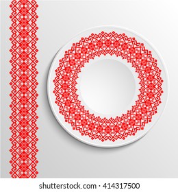 Decorative plate with round ethnic ornament. Ukrainian style.  Folk pattern. Vintage background of napkin. Red tones.