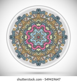 Decorative plate with round ornament in ethnic style. Abstract colored Mandala art, stylized floral pattern. Home decor, interior design, fashion background with colorful ornate dish