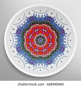 Decorative plate with round ornament in ethnic style. Abstract colored Mandala art, stylized floral pattern. Home decor, interior design, fashion background with colorful ornate dish