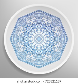 Decorative plate with round ornament in ethnic style. Abstract colored Mandala art, stylized floral pattern. Home decor, interior design, fashion background with colorful ornate dish
