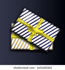 Decorative realistic vector gift box with a  bow and a  ribbon.
