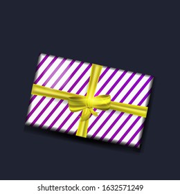 Decorative realistic vector gift box with a  bow and a  ribbon.