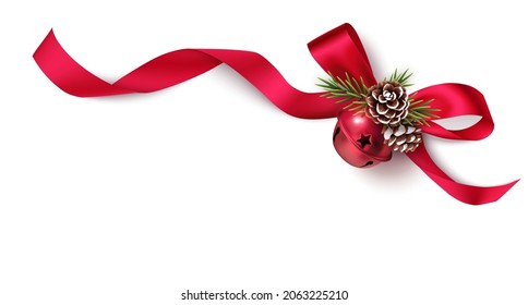 Decorative red bow, bell and pine cones with swirled ribbon and pine branches isolated on white background. Christmas and New Year decoration corner and frame element for your design