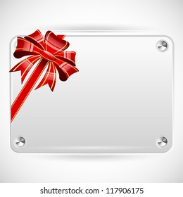 Decorative red ribbon and bow on a background of white plate with copyspace - vector illustration
