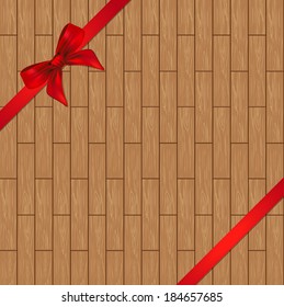Decorative red ribbon and bow over wooden background. vector 