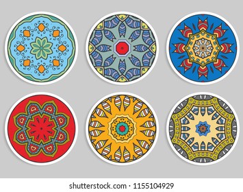 Decorative round ornaments set, isolated elements. Colorful mandala, stylized flower. Abstract geometric doodle patterns for plate decoration, fabric print,  business or greeting card design