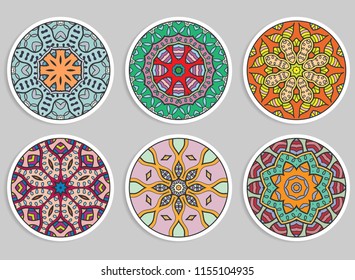 Decorative round ornaments set, isolated elements. Colorful mandala, stylized flower. Abstract geometric doodle patterns for plate decoration, fabric print,  business or greeting card design