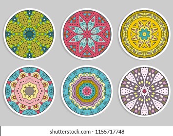 Decorative round ornaments set, isolated elements. Colorful mandala, stylized flower. Abstract geometric doodle patterns for plate decoration, fabric print,  business or greeting card design