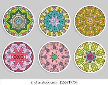 Decorative round ornaments set, isolated elements. Colorful mandala, stylized flower. Abstract geometric doodle patterns for plate decoration, fabric print,  business or greeting card design