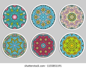 Decorative round ornaments set, isolated elements. Colorful mandala, stylized flower. Abstract geometric doodle patterns for plate decoration, fabric print,  business or greeting card design