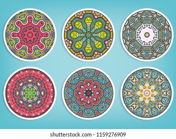 Decorative round ornaments set, isolated elements. Colorful mandala, stylized flower. Abstract geometric doodle patterns for plate decoration, fabric print,  business or greeting card design
