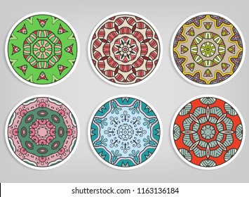 Decorative round ornaments set, isolated elements. Colorful mandala, stylized flower. Abstract geometric doodle patterns for plate decoration, fabric print,  business or greeting card design