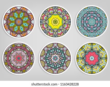 Decorative round ornaments set, isolated elements. Colorful mandala, stylized flower. Abstract geometric doodle patterns for plate decoration, fabric print,  business or greeting card design