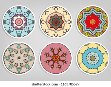 Decorative round ornaments set, isolated elements. Colorful mandala, stylized flower. Abstract geometric doodle patterns for plate decoration, fabric print,  business or greeting card design