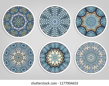 Decorative round ornaments set, isolated elements. Colorful mandala, stylized flower. Abstract geometric doodle patterns for plate decoration, fabric print,  business or greeting card design