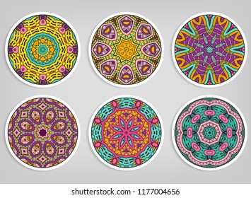 Decorative round ornaments set, isolated elements. Colorful mandala, stylized flower. Abstract geometric doodle patterns for plate decoration, fabric print,  business or greeting card design