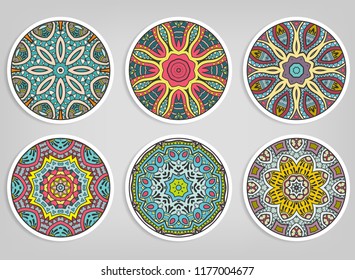 Decorative round ornaments set, isolated elements. Colorful mandala, stylized flower. Abstract geometric doodle patterns for plate decoration, fabric print,  business or greeting card design