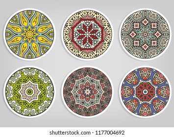 Decorative round ornaments set, isolated elements. Colorful mandala, stylized flower. Abstract geometric doodle patterns for plate decoration, fabric print,  business or greeting card design