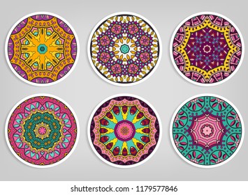 Decorative round ornaments set, isolated elements. Colorful mandala, stylized flower. Abstract geometric doodle patterns for plate decoration, fabric print,  business or greeting card design