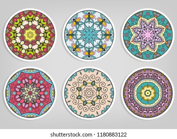 Decorative round ornaments set, isolated elements. Colorful mandala, stylized flower. Abstract geometric doodle patterns for plate decoration, fabric print,  business or greeting card design