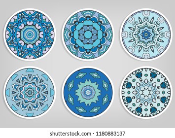 Decorative round ornaments set, isolated elements. Colorful mandala, stylized flower. Abstract geometric doodle patterns for plate decoration, fabric print,  business or greeting card design