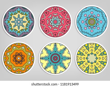 Decorative round ornaments set, isolated elements. Colorful mandala, stylized flower. Abstract geometric doodle patterns for plate decoration, fabric print,  business or greeting card design