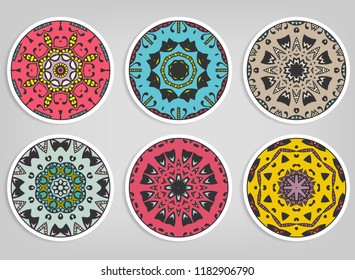 Decorative round ornaments set, isolated elements. Colorful mandala, stylized flower. Abstract geometric doodle patterns for plate decoration, fabric print,  business or greeting card design
